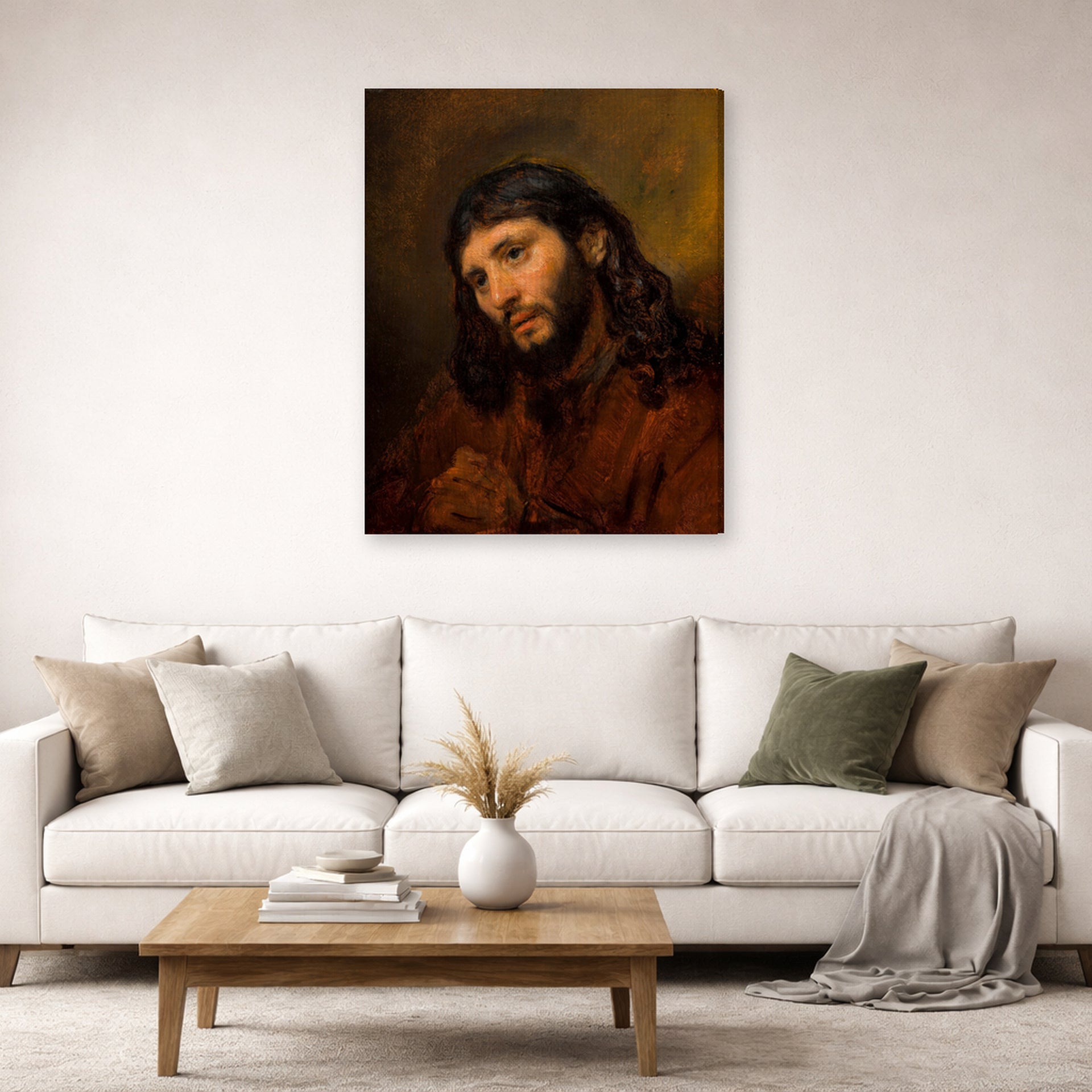 Gallery-wrapped canvas print of Rembrandt's Study for the Head of Young Man displayed on a wall in a living room