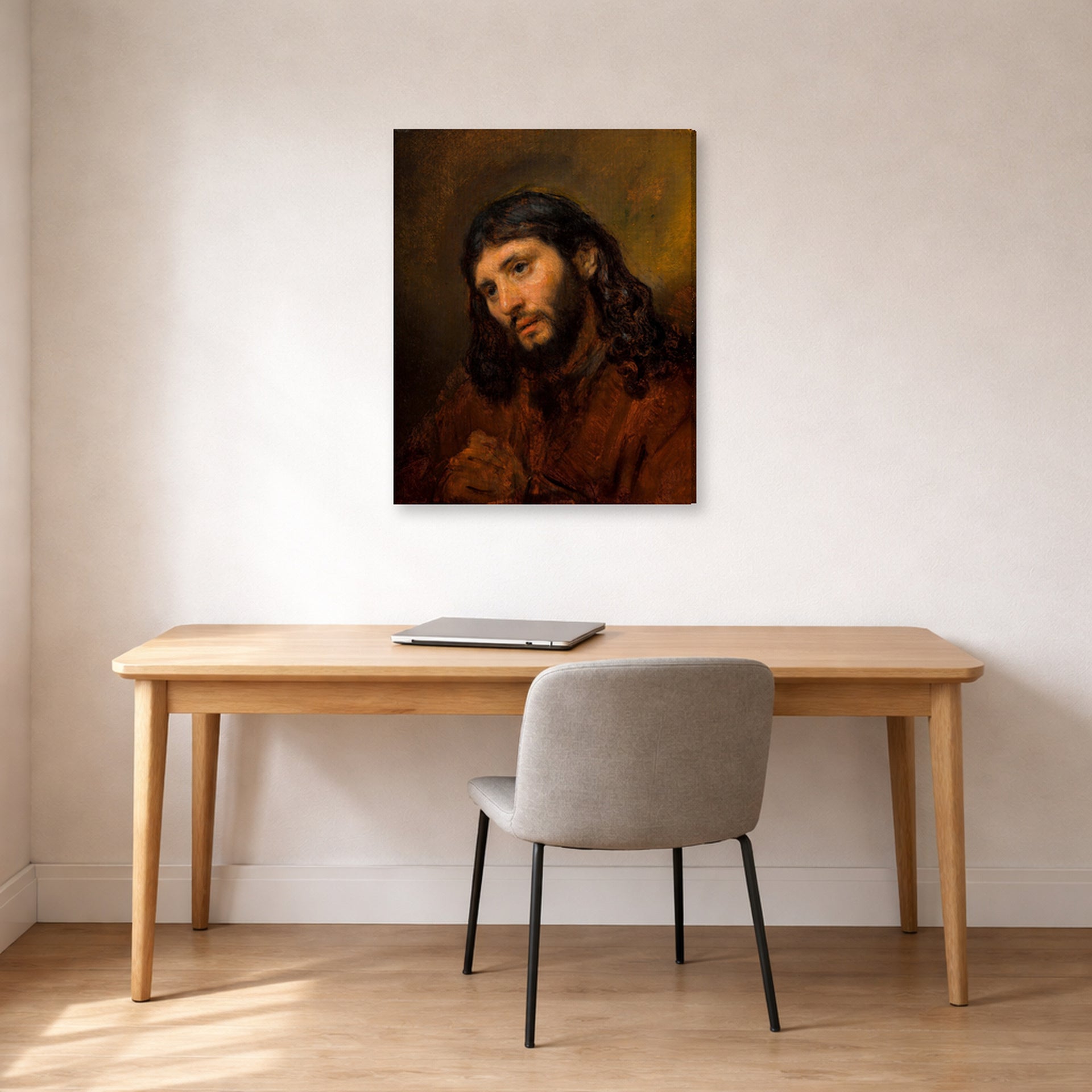 Gallery-wrapped canvas print of Rembrandt's Study for the Head of Young Man displayed on a wall in an office