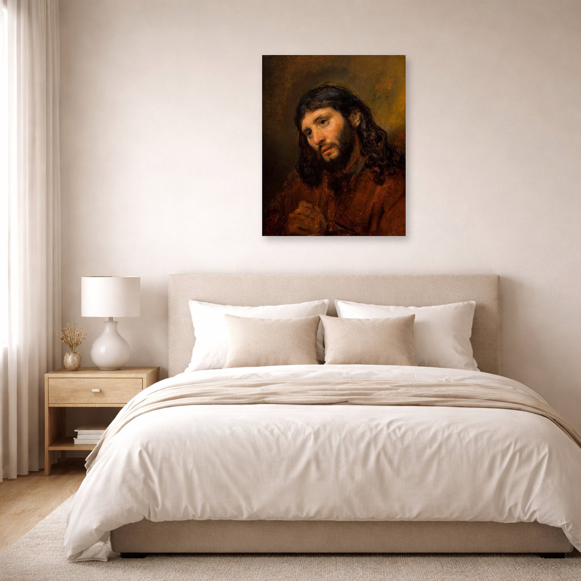 Unframed poster print of Rembrandt's Study for the Head of Young Man displayed on a wall in a bedroom