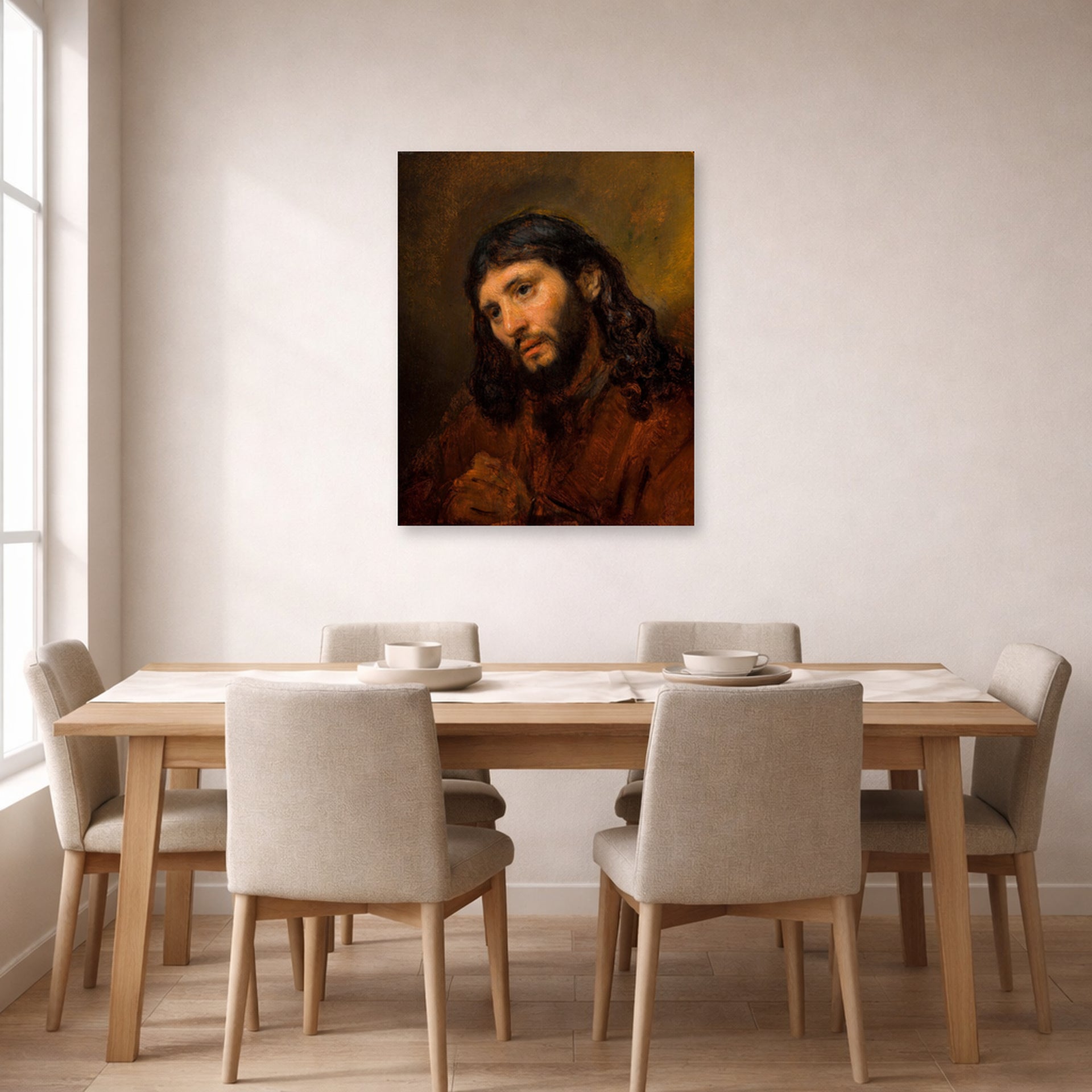 Unframed poster print of Rembrandt's Study for the Head of Young Man displayed on a wall in a dining room