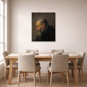 Unframed poster print of Rembrandt's Study of an Old Man in Profile displayed on a wall in a dining room