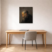 Unframed poster print of Rembrandt's Study of an Old Man in Profile displayed on a wall in an office