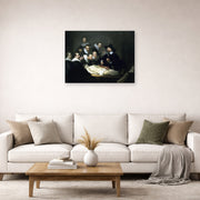 Unframed poster print of Rembrandt's The Anatomy Lesson of Dr. Nicolaes Tulp displayed on a wall in a living room