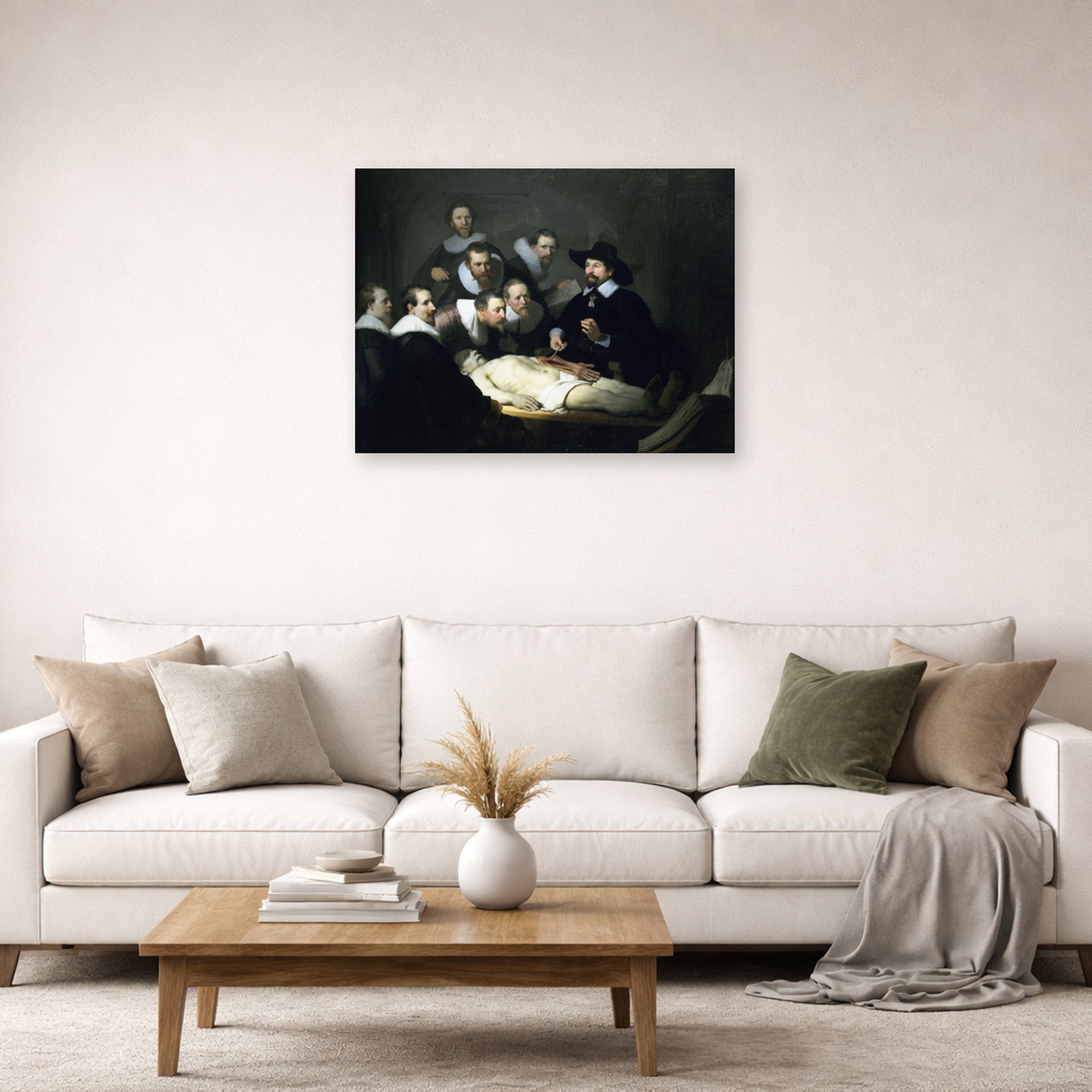 Unframed poster print of Rembrandt's The Anatomy Lesson of Dr. Nicolaes Tulp displayed on a wall in a living room