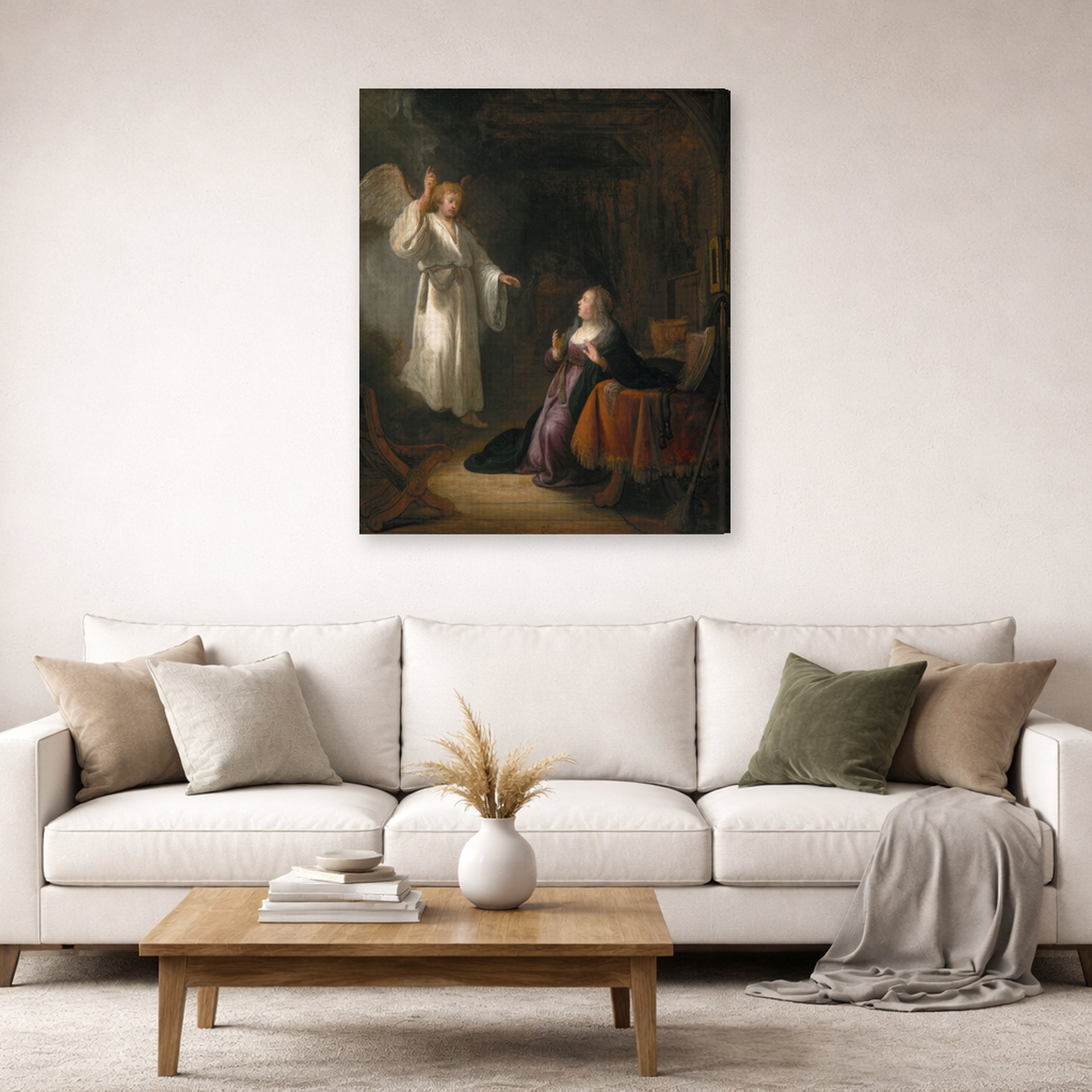 Gallery-wrapped canvas print of Rembrandt's The Annunciation displayed on a wall in a living room