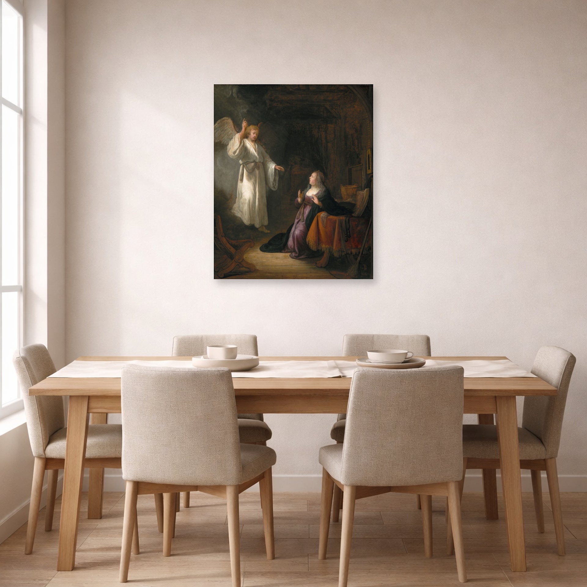 Unframed poster print of Rembrandt's The Annunciation displayed on a wall in a dining room