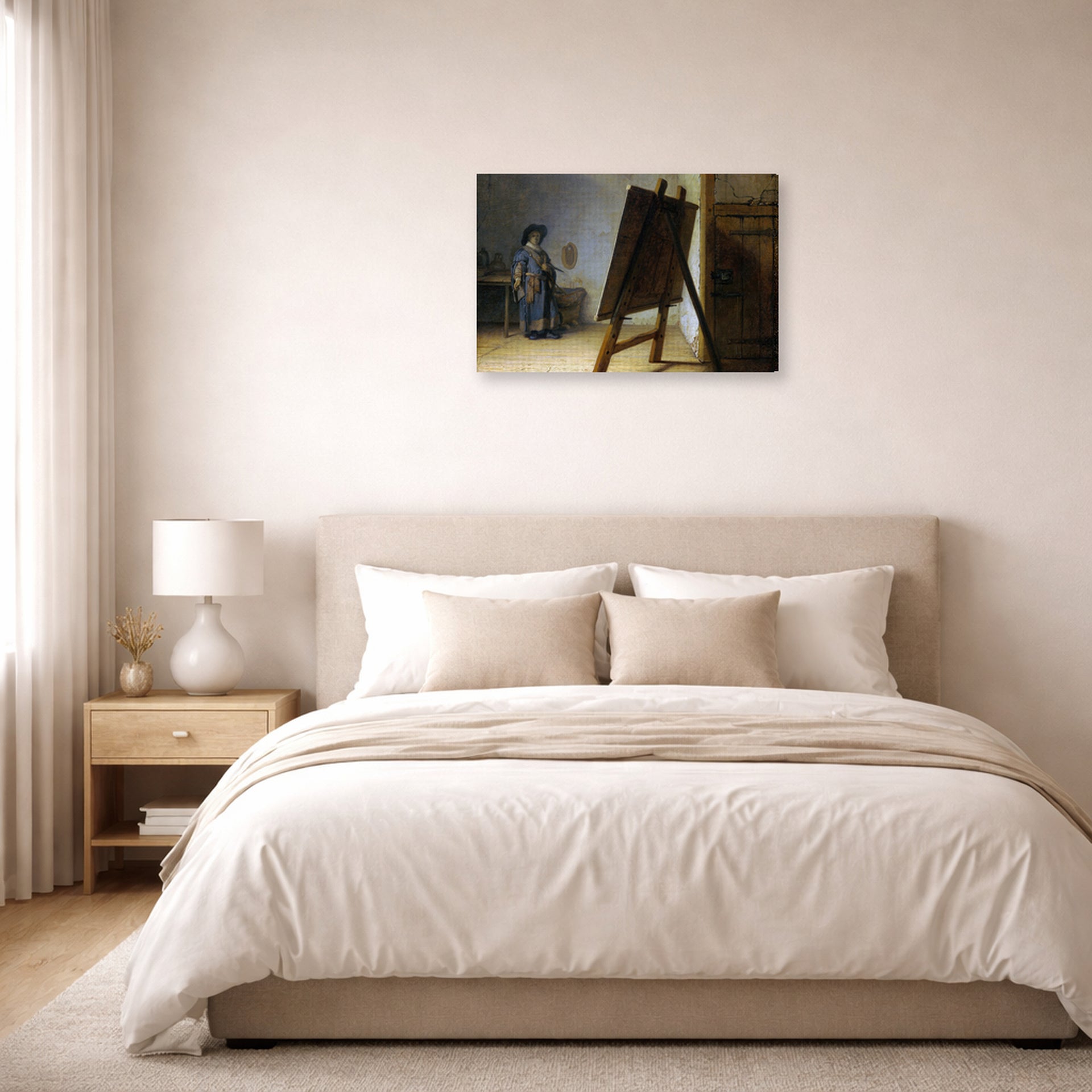 Gallery-wrapped canvas print of Rembrandt's The Artist in his Studio displayed on a wall in a bedroom