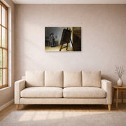 Unframed poster print of Rembrandt's The Artist in his Studio displayed on a wall in a living room