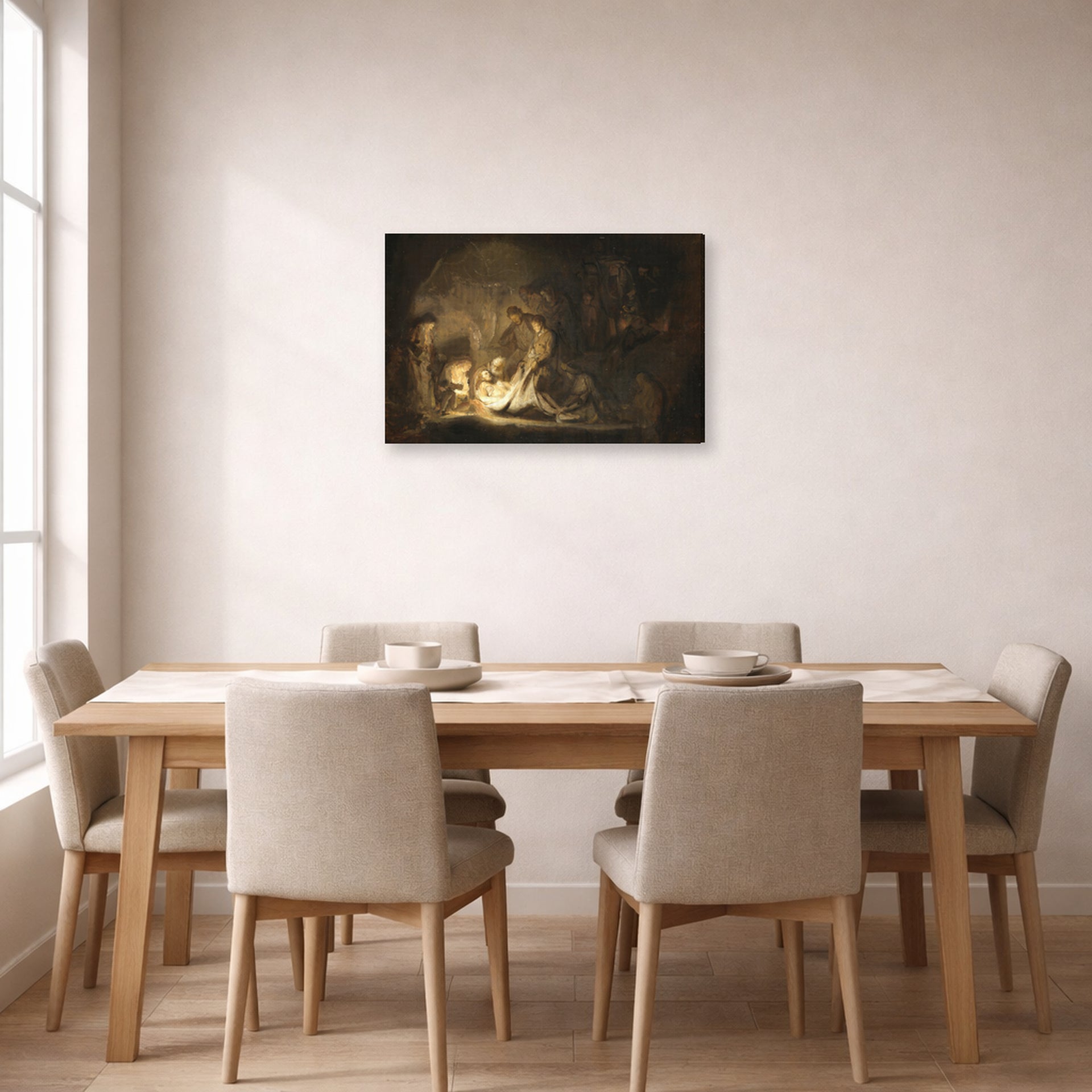 Gallery-wrapped canvas print of Rembrandt's The Entombment displayed on a wall in a dining room