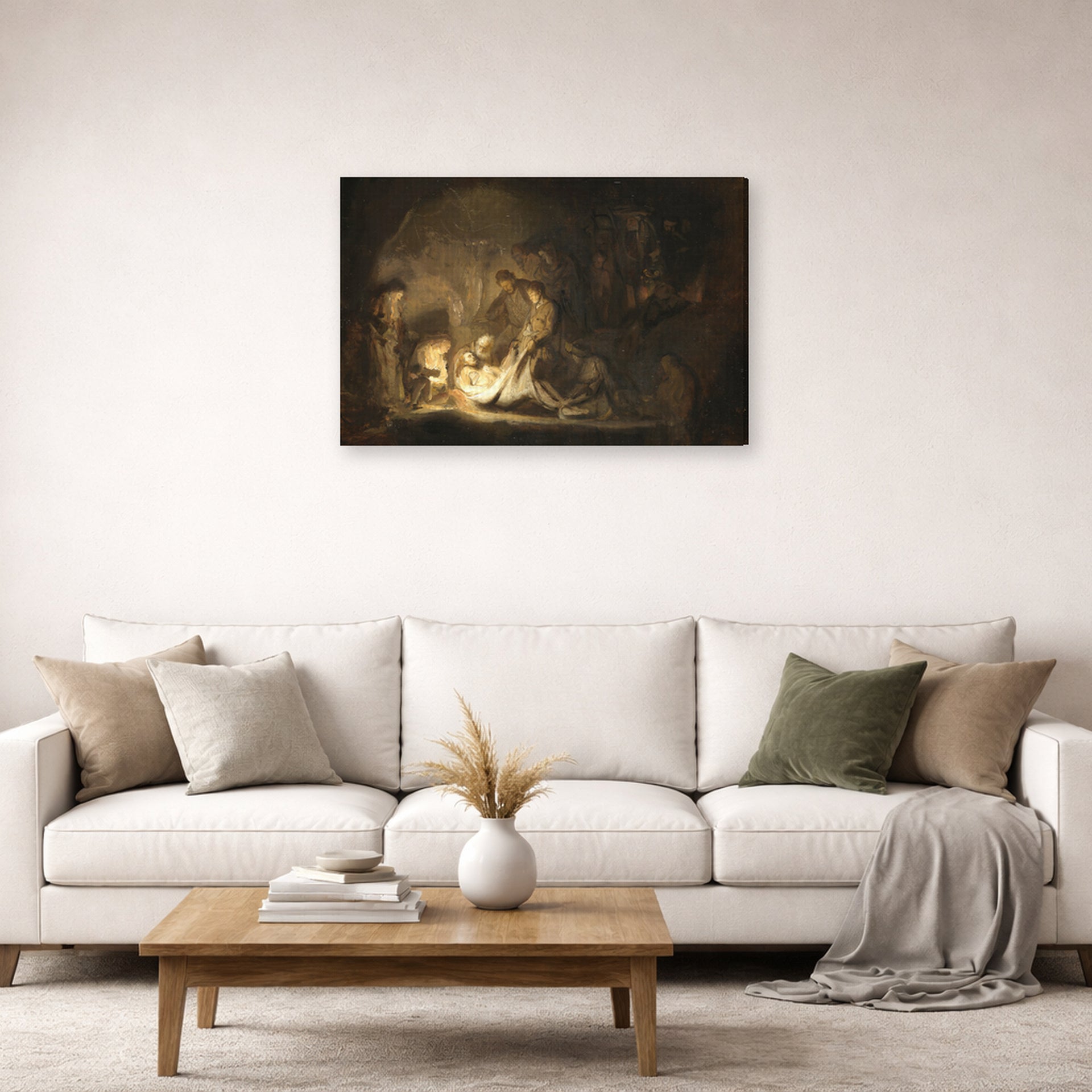 Gallery-wrapped canvas print of Rembrandt's The Entombment displayed on a wall in a living room