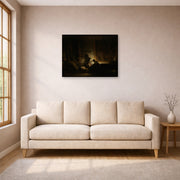 Gallery-wrapped canvas print of Rembrandt's The Holy Family by Night displayed on a wall in a living room