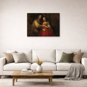 Gallery-wrapped canvas print of Rembrandt's The Jewish Bride displayed on a wall in a living room