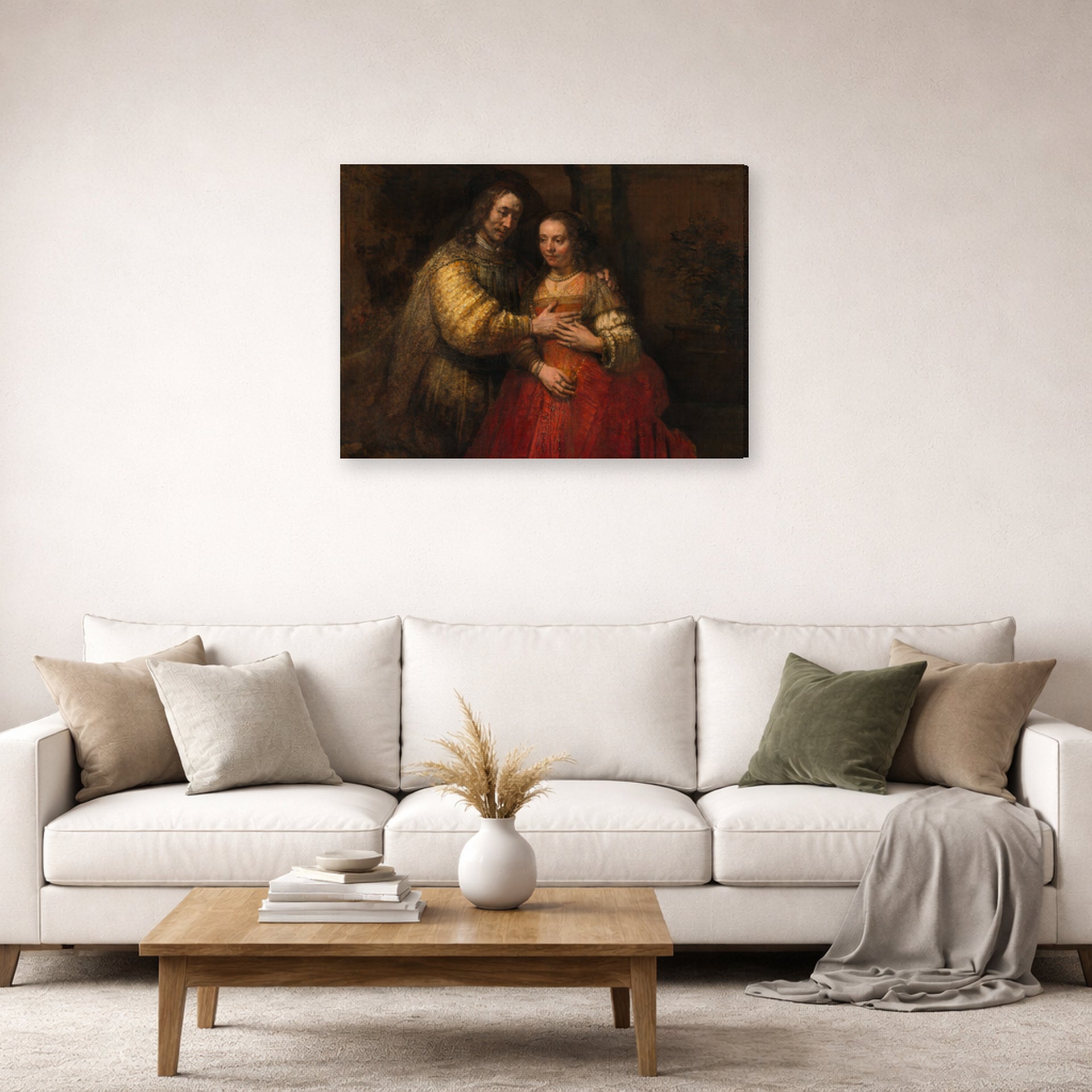 Gallery-wrapped canvas print of Rembrandt's The Jewish Bride displayed on a wall in a living room