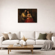 Unframed poster print of Rembrandt's The Jewish Bride displayed on a wall in a living room
