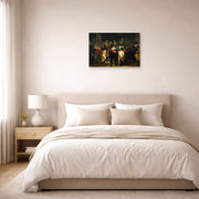 Unframed poster print of Rembrandt's The Night Watch displayed on a wall in a bedroom
