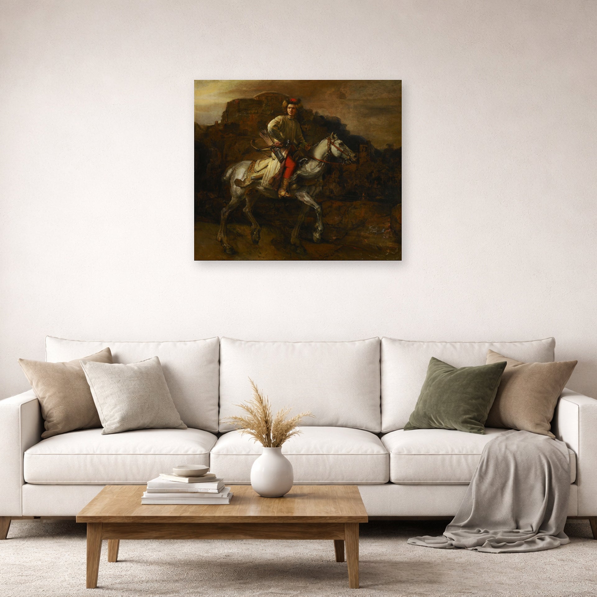 Unframed poster print of Rembrandt's The Polish Rider displayed on a wall in a living room