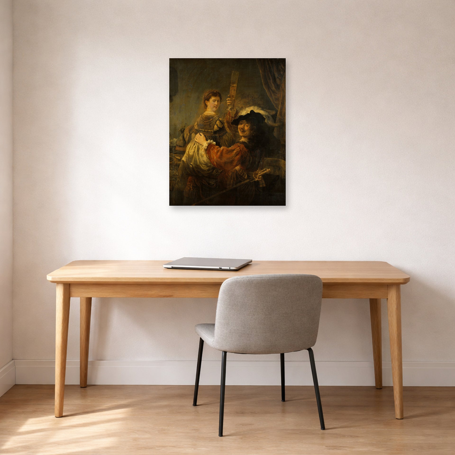 Unframed poster print of Rembrandt's The Prodigal Son in the Tavern displayed on a wall in an office