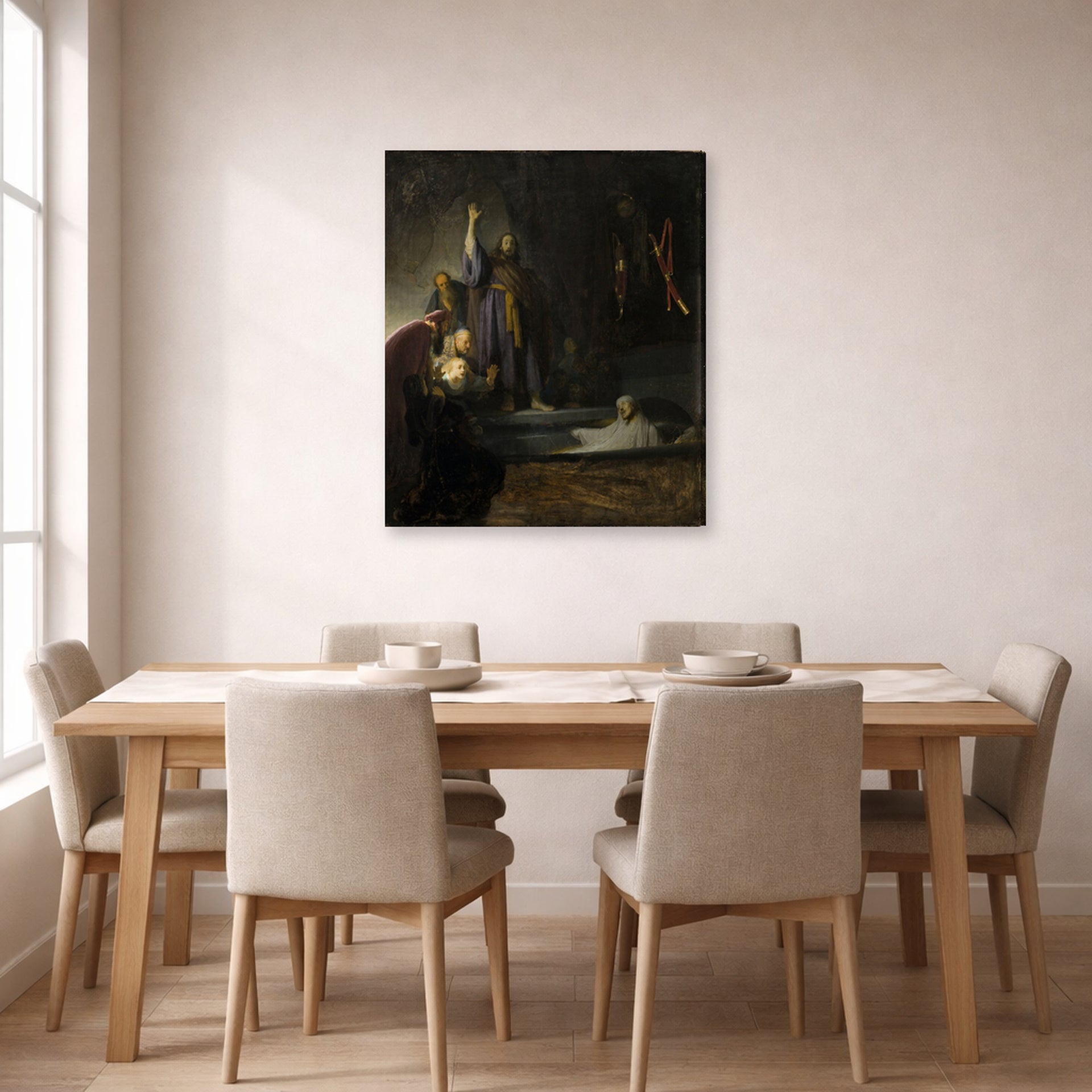 Gallery-wrapped canvas print of Rembrandt's The Raising of Lazarus displayed on a wall in a dining room