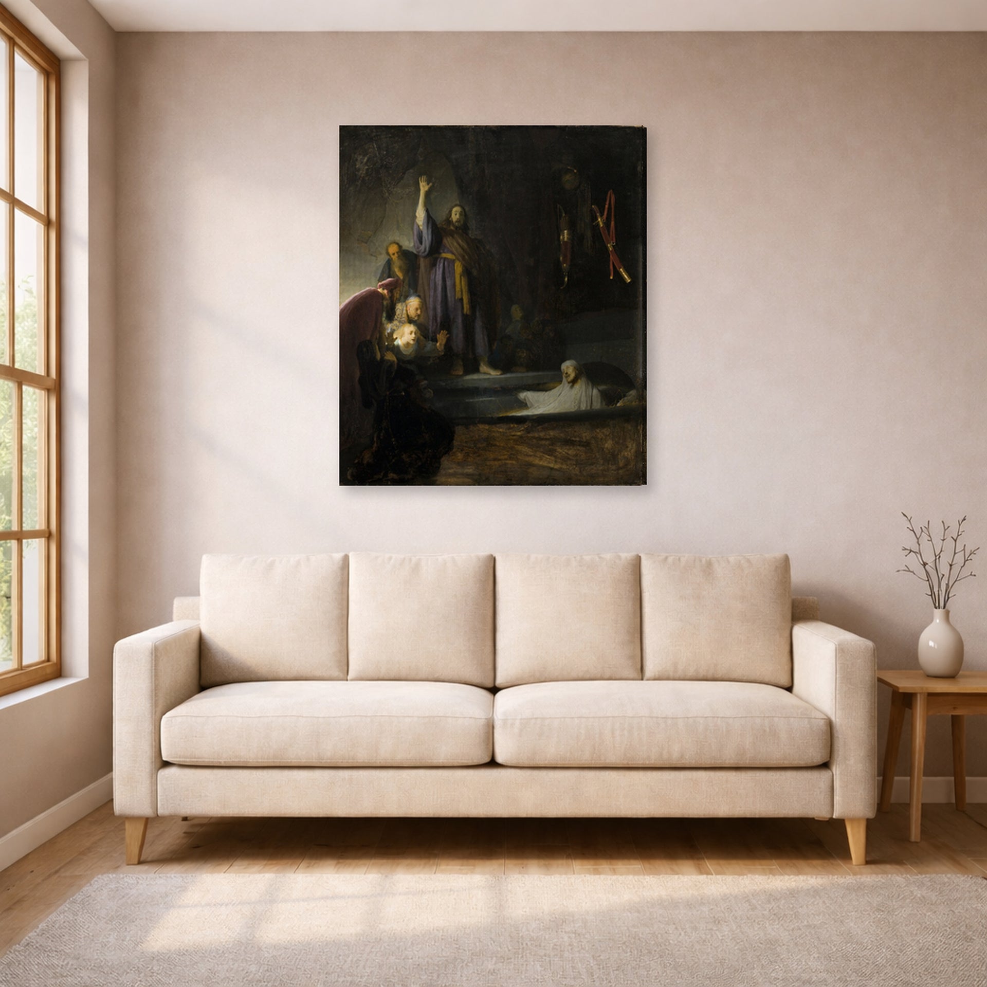 Gallery-wrapped canvas print of Rembrandt's The Raising of Lazarus displayed on a wall in a living room