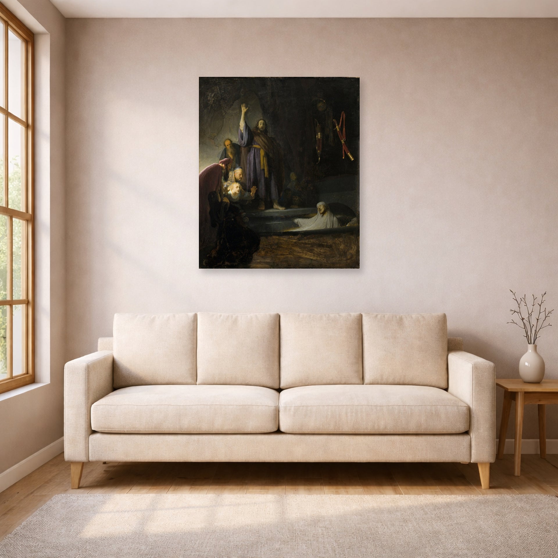Unframed poster print of Rembrandt's The Raising of Lazarus displayed on a wall in a living room