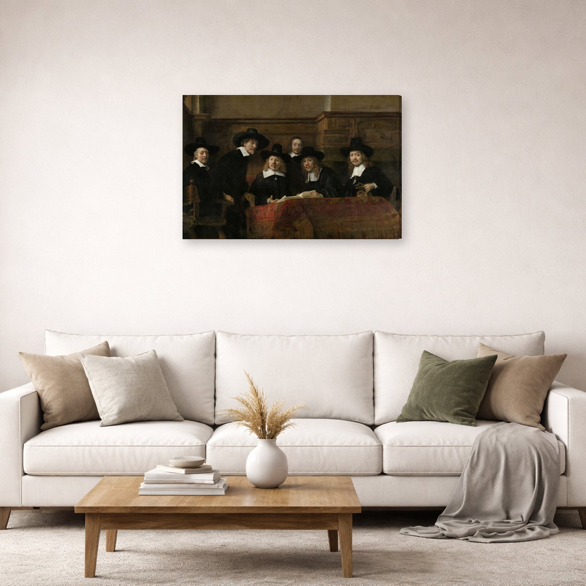 Gallery-wrapped canvas print of Rembrandt's The Syndics of the Clothmakers Guild displayed on a wall in a living room