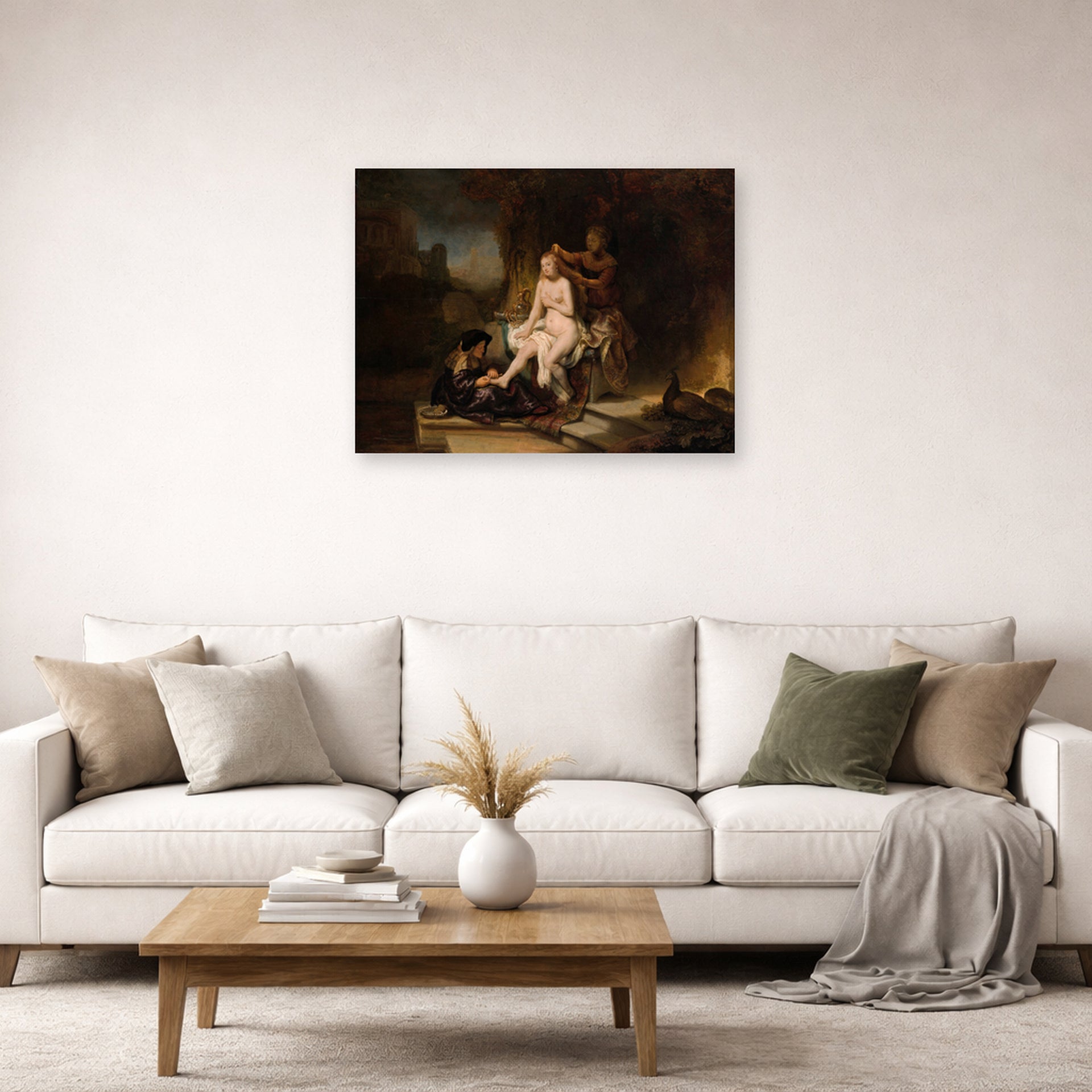 Unframed poster print of Rembrandt's The Toilet of Bathsheba displayed on a wall in a living room