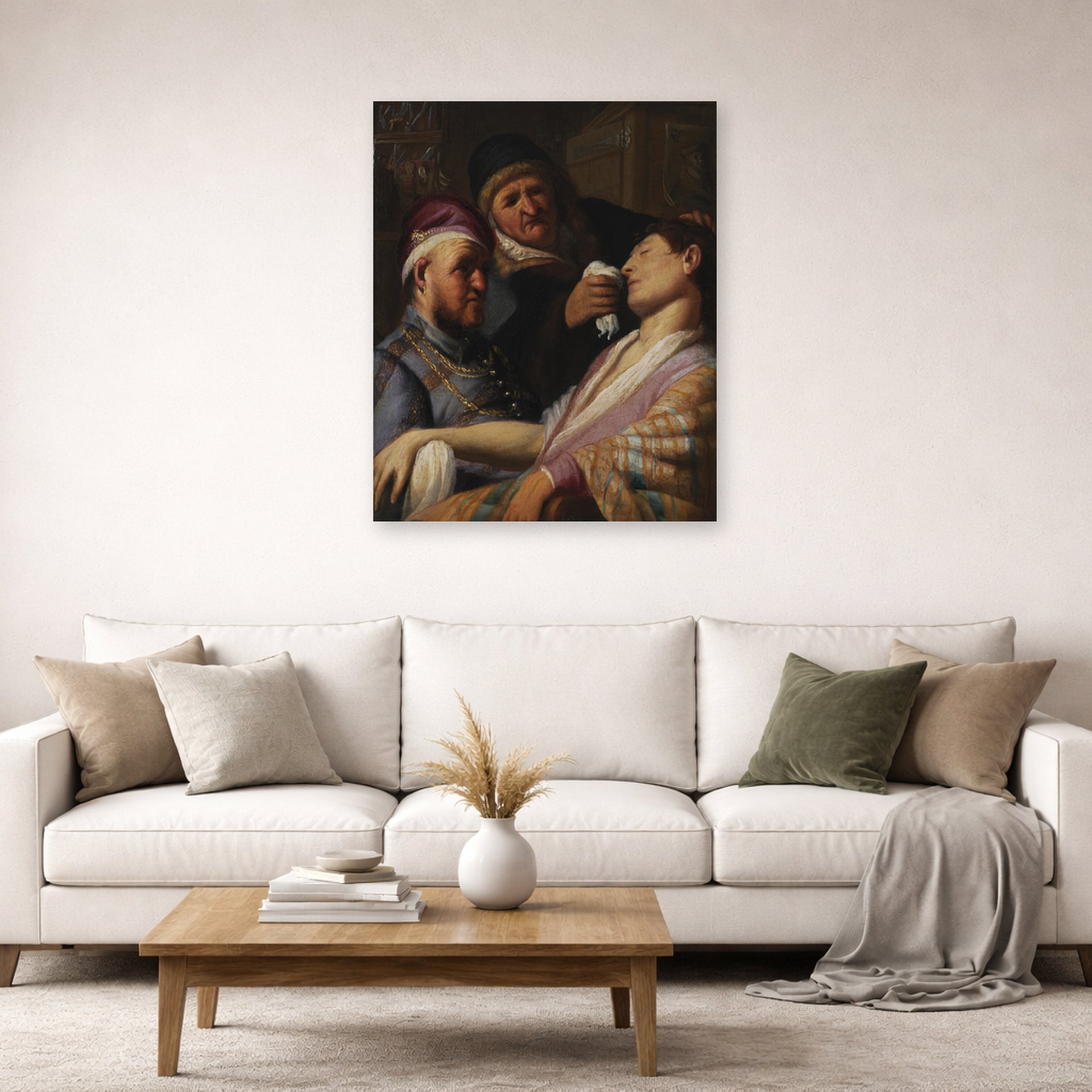 Unframed poster print of Rembrandt's The Unconscious Patient (allegory of Smell) displayed on a wall in a living room