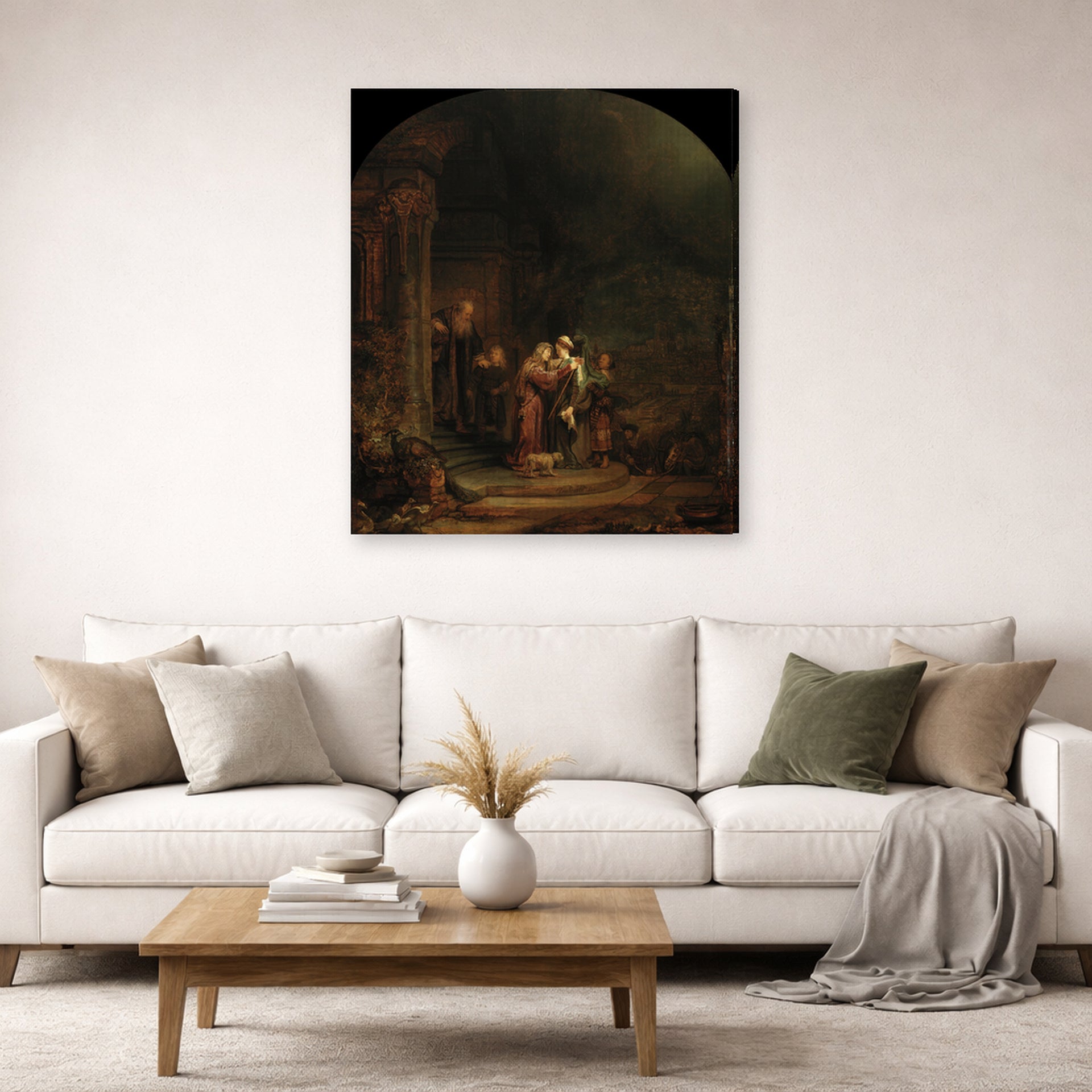 Gallery-wrapped canvas print of Rembrandt's The Visitation displayed on a wall in a living room
