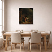 Unframed poster print of Rembrandt's The Visitation displayed on a wall in a dining room