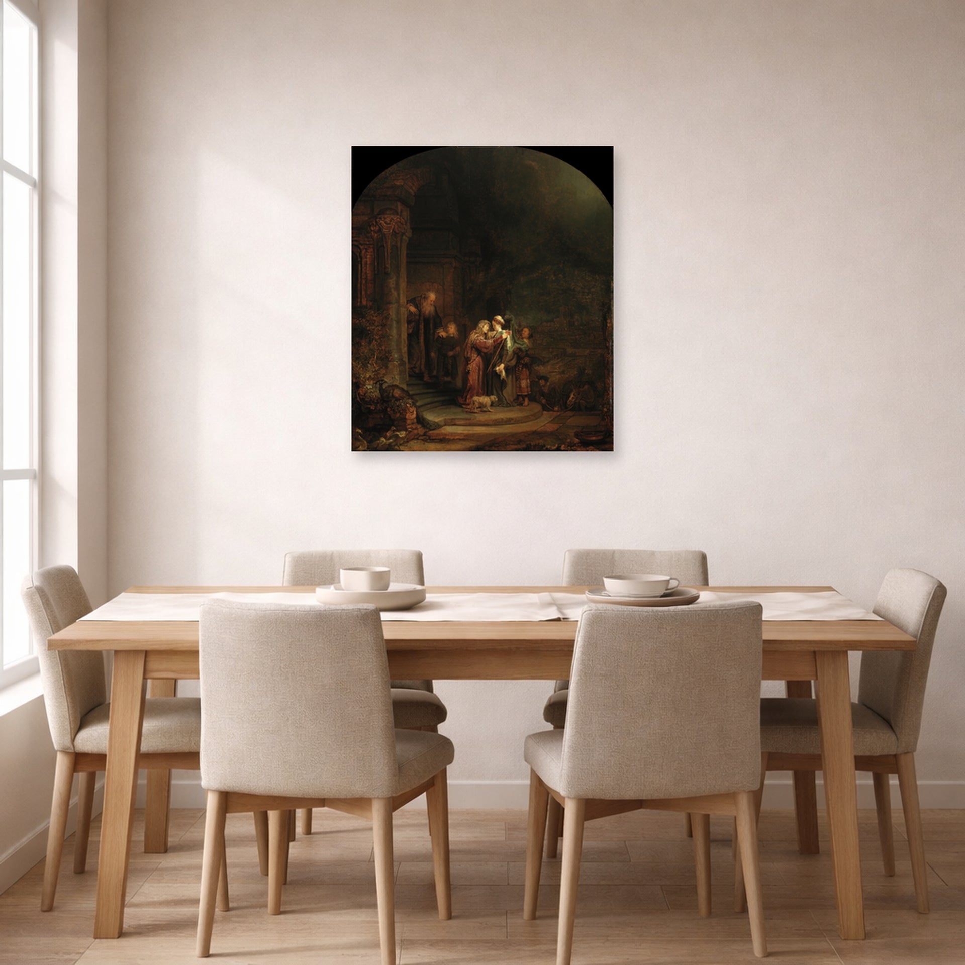 Unframed poster print of Rembrandt's The Visitation displayed on a wall in a dining room