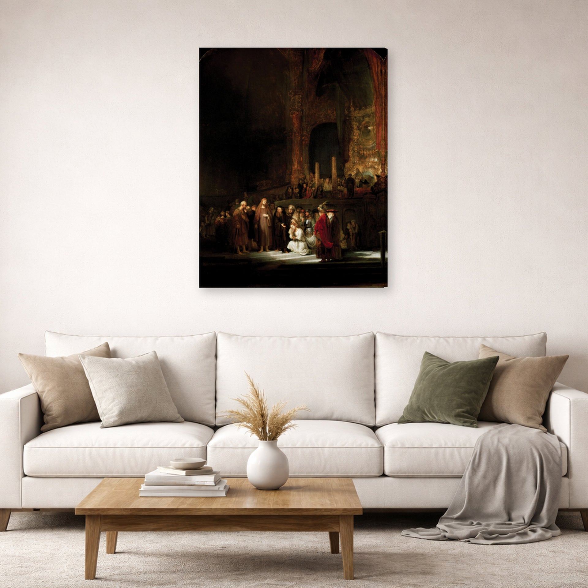 Gallery-wrapped canvas print of Rembrandt's The Woman Taken in Adultery displayed on a wall in a living room