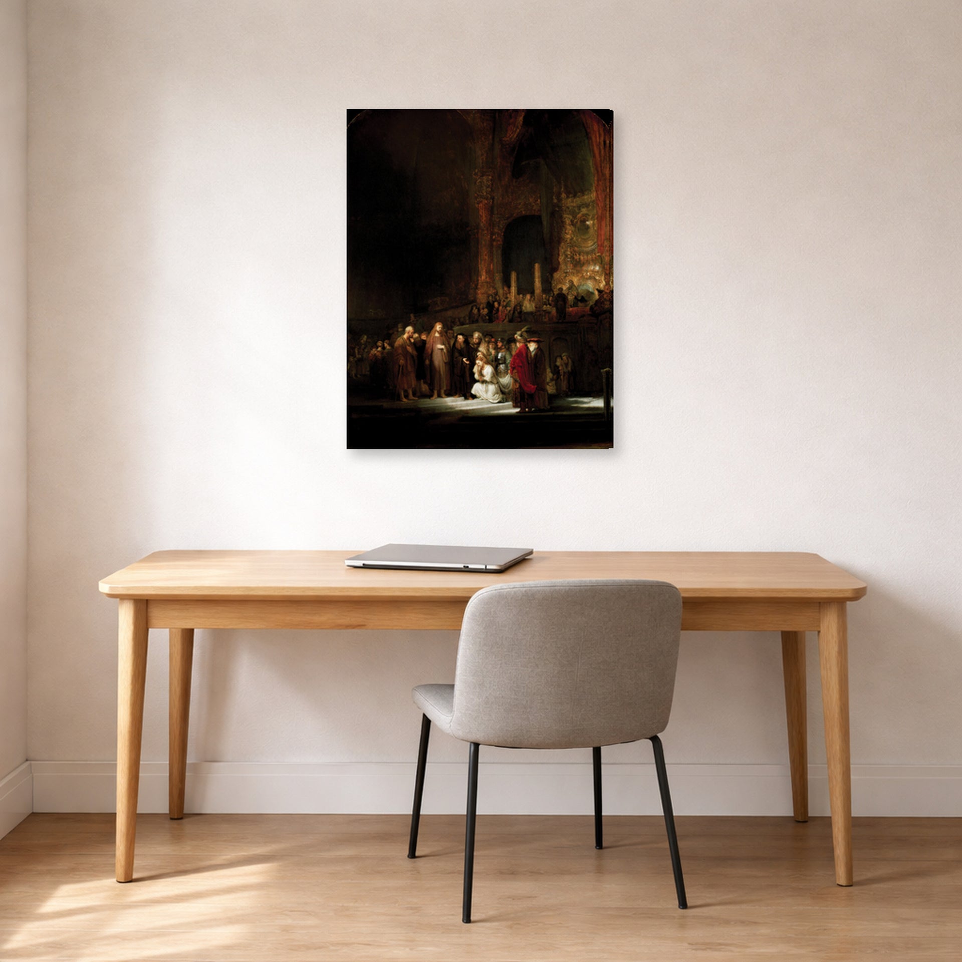 Gallery-wrapped canvas print of Rembrandt's The Woman Taken in Adultery displayed on a wall in an office