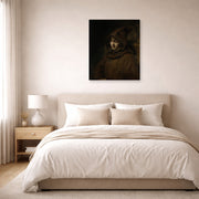 Unframed poster print of Rembrandt's Titus in a Monk's Habit displayed on a wall in a bedroom