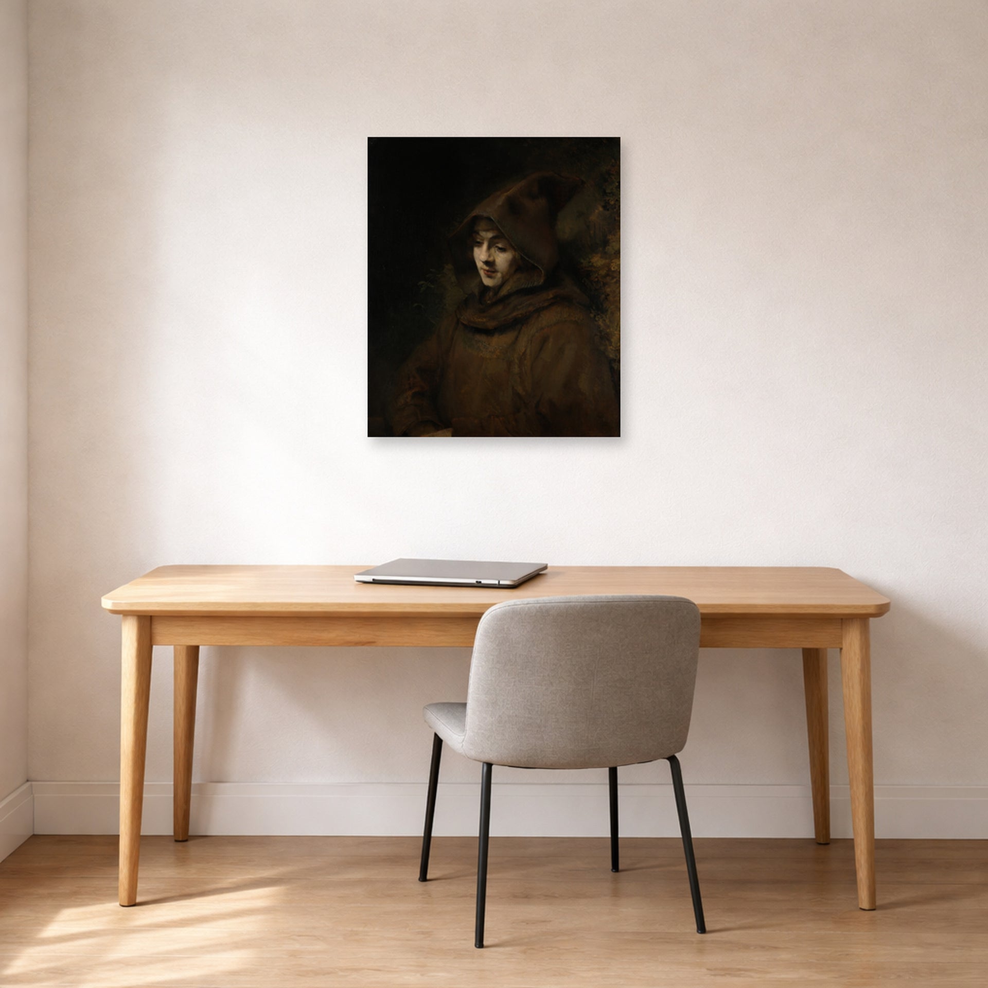 Unframed poster print of Rembrandt's Titus in a Monk's Habit displayed on a wall in an office