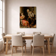 Gallery-wrapped canvas print of Rembrandt's Tobit and Anna with the Kid displayed on a wall in a dining room