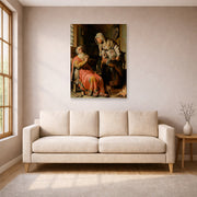 Unframed poster print of Rembrandt's Tobit and Anna with the Kid displayed on a wall in a living room