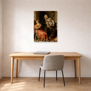 Unframed poster print of Rembrandt's Tobit and Anna with the Kid displayed on a wall in an office