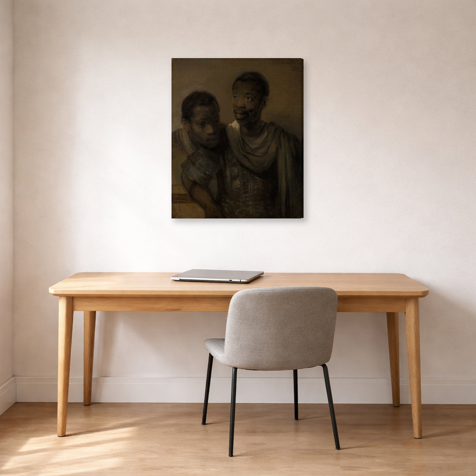 Gallery-wrapped canvas print of Rembrandt's Two Moors displayed on a wall in an office