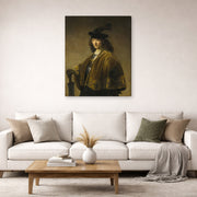 Gallery-wrapped canvas print of Rembrandt's Young Man with a Sword displayed on a wall in a living room
