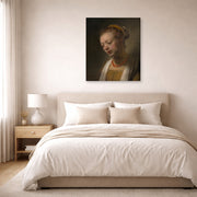 Gallery-wrapped canvas print of Rembrandt's Young Woman with a Red Necklace displayed on a wall in a bedroom