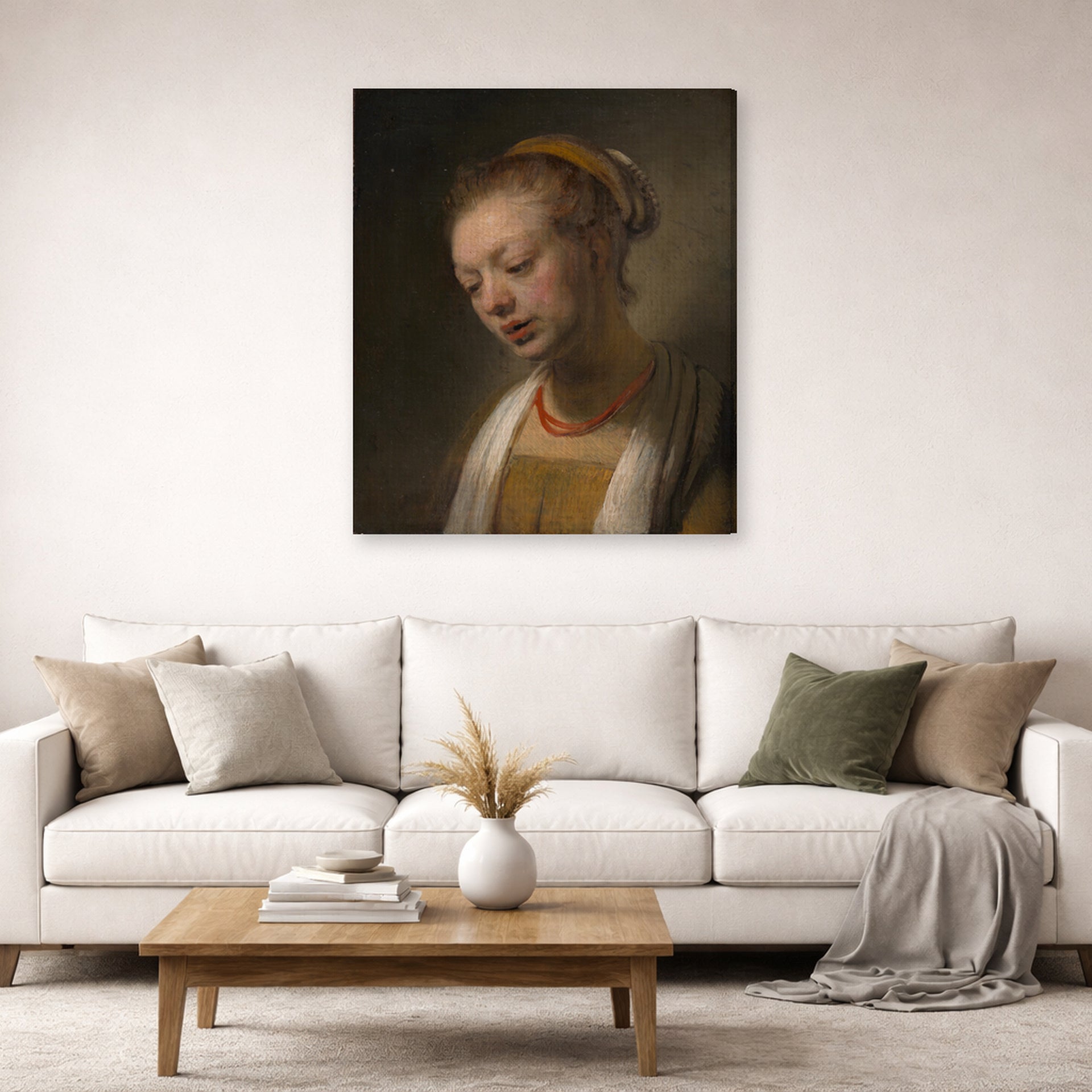 Gallery-wrapped canvas print of Rembrandt's Young Woman with a Red Necklace displayed on a wall in a living room