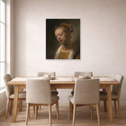 Unframed poster print of Rembrandt's Young Woman with a Red Necklace displayed on a wall in a dining room