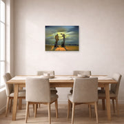 Unframed poster print of Salvador Dali's Archeological Reminiscence of Millet's Angelus displayed on a wall in a dining room