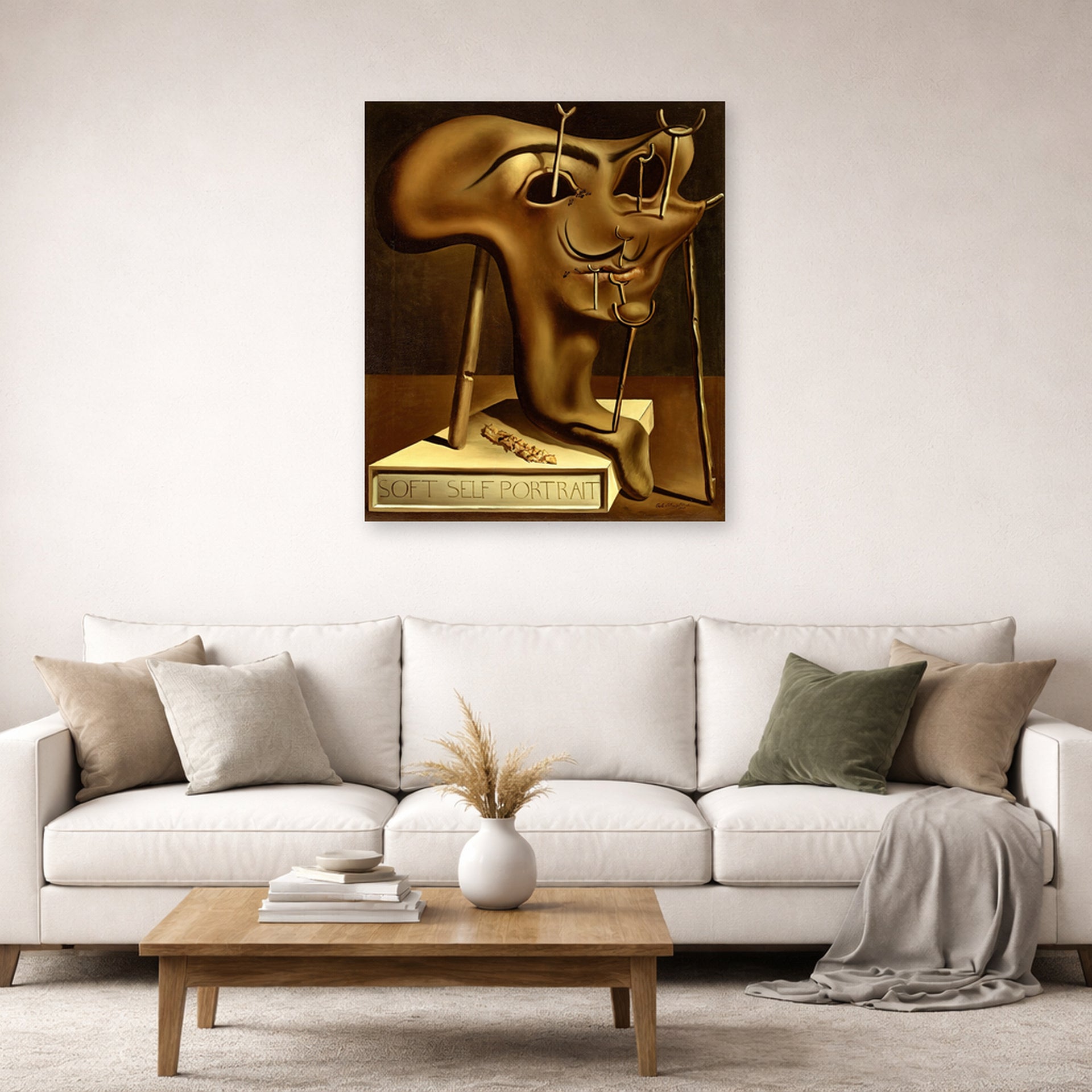 Unframed poster print of Salvador Dali's Autoportrait displayed on a wall in a living room