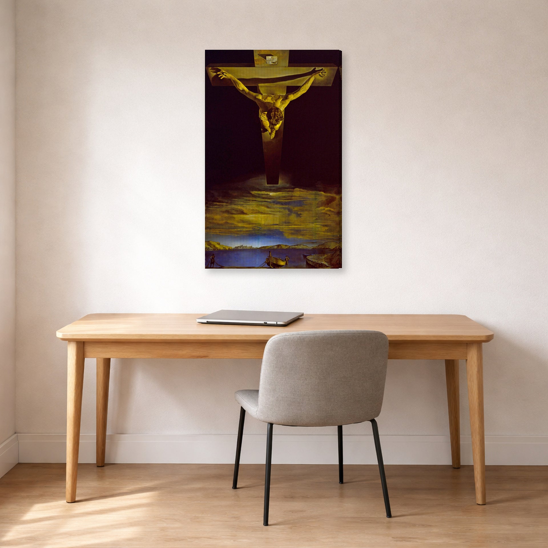 Gallery-wrapped canvas print of Salvador Dali's Christ of St. John of the Cross displayed on a wall in a office