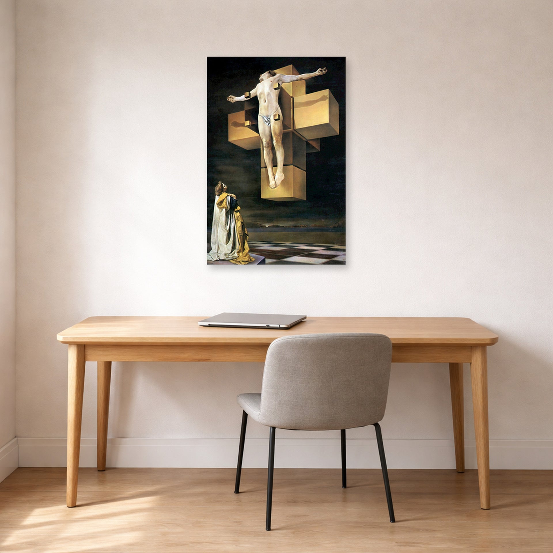 Unframed poster print of Salvador Dali's Crucifixion displayed on a wall in a office