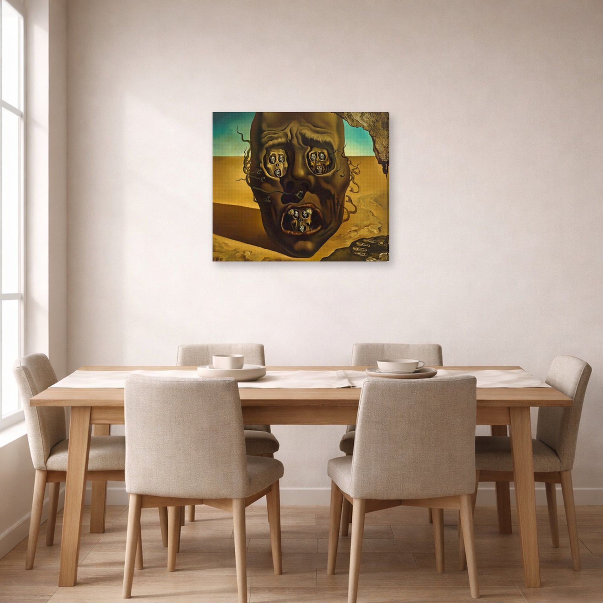 Gallery-wrapped canvas print of Salvador Dali's Face of War displayed on a wall in a dining room