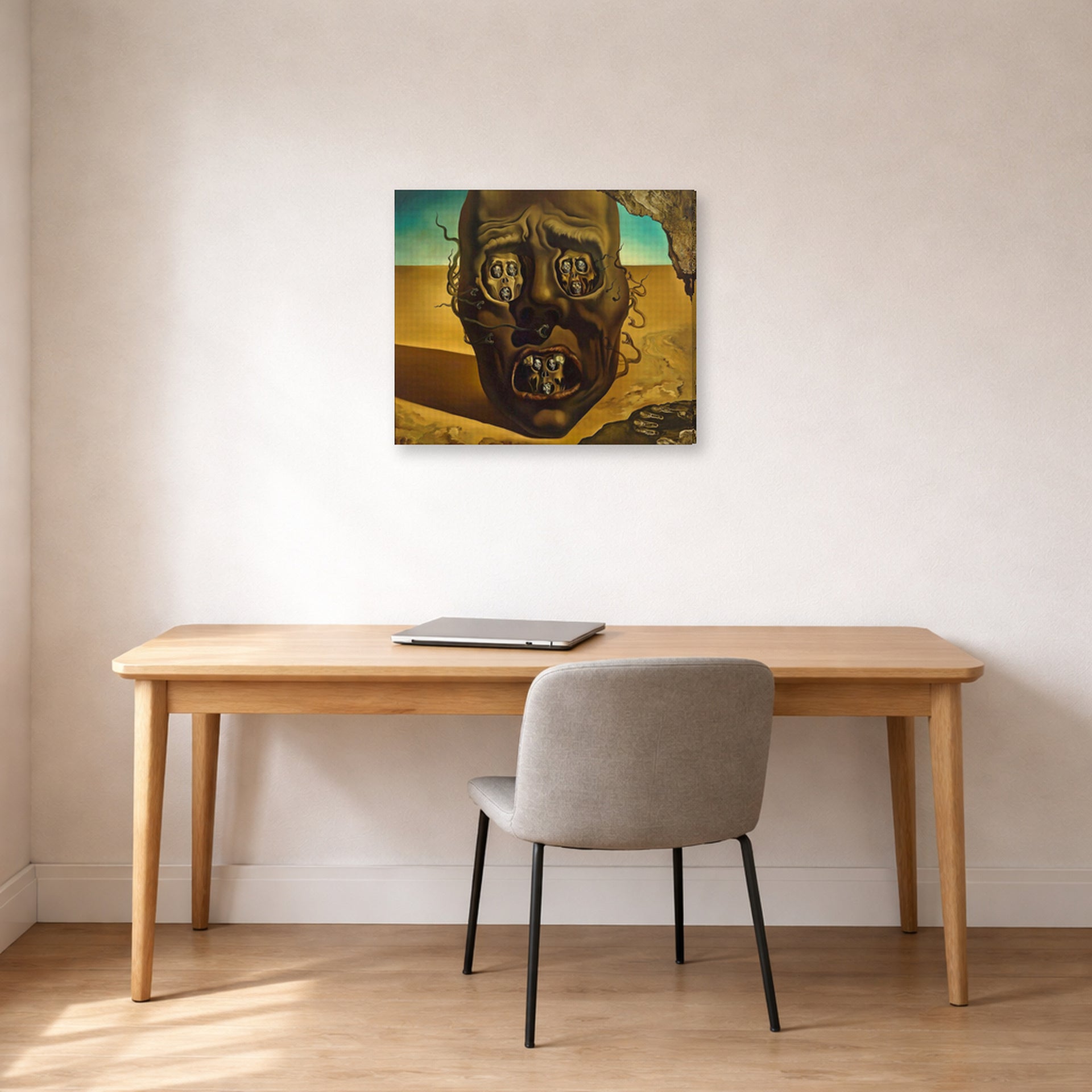 Gallery-wrapped canvas print of Salvador Dali's Face of War displayed on a wall in a office