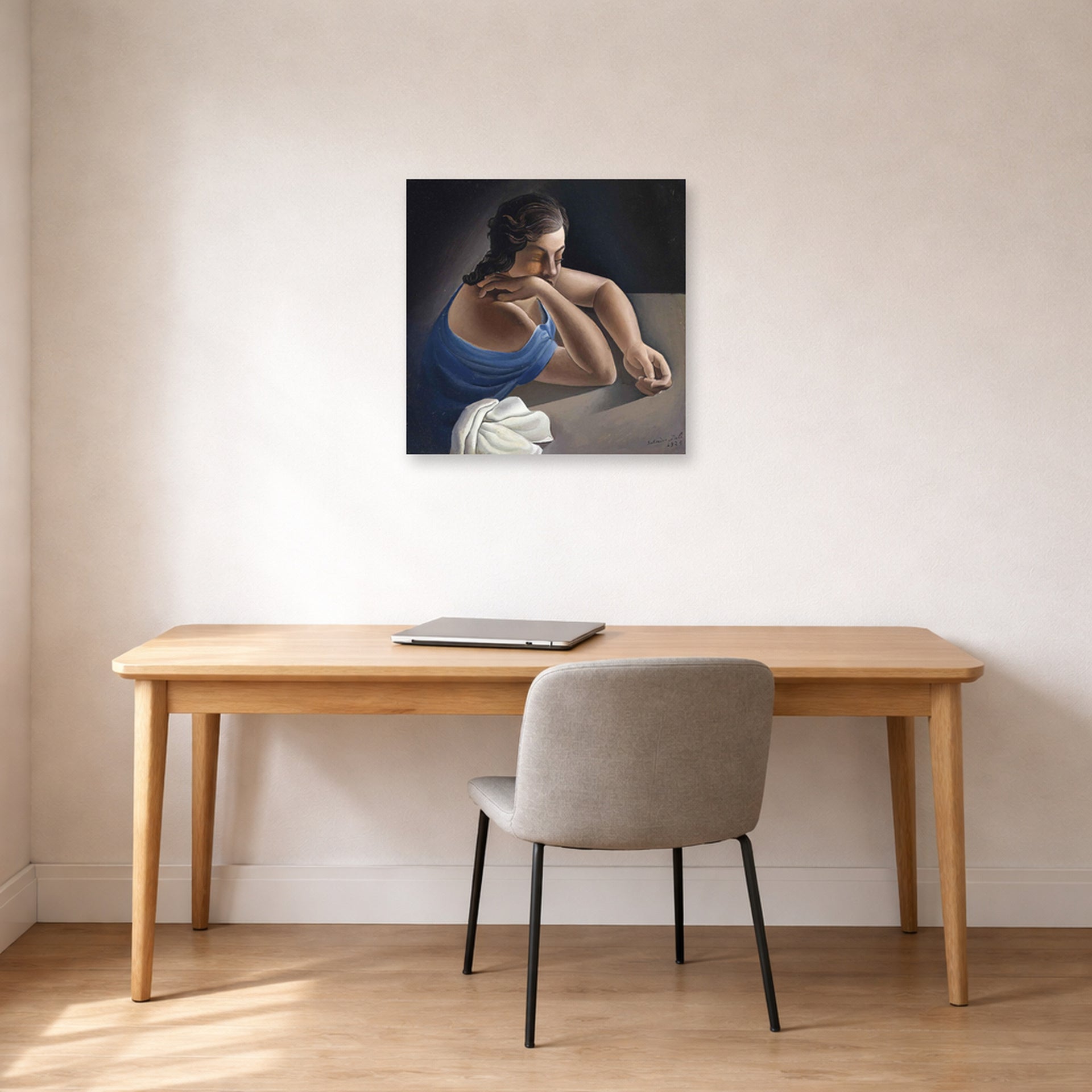 Unframed poster print of Salvador Dali's Figure in a Table displayed on a wall in a office