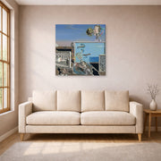 Gallery-wrapped canvas print of Salvador Dali's Illumined Pleasures displayed on a wall in a living room